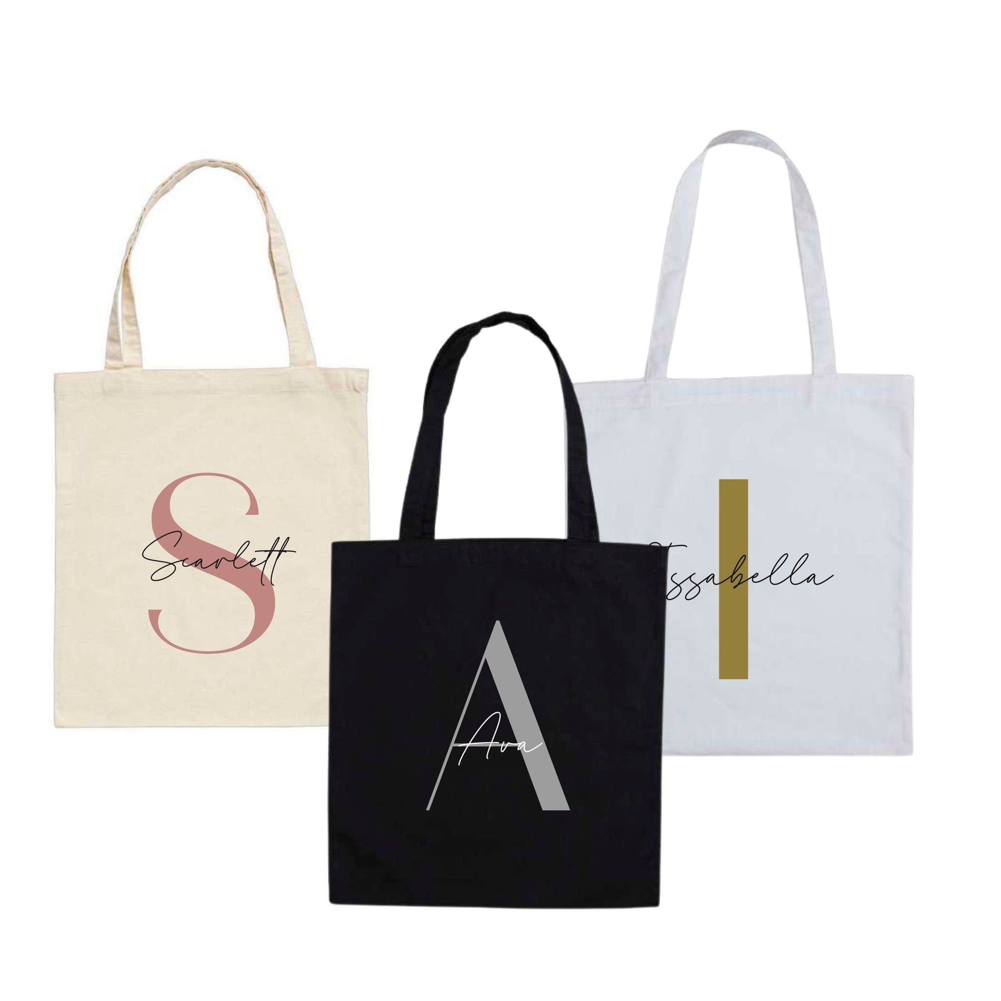 Set of three personalised cotton tote bags in black, white, and natural – names Scarlett, Ava, and Isabella with large initials S, A, I.
