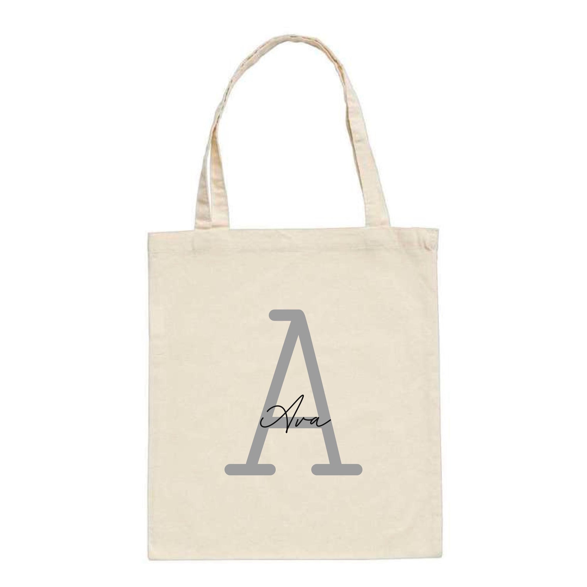 Personalised natural tote bag featuring the name "Ava" over a large silver letter A – custom initial cotton bag for her.