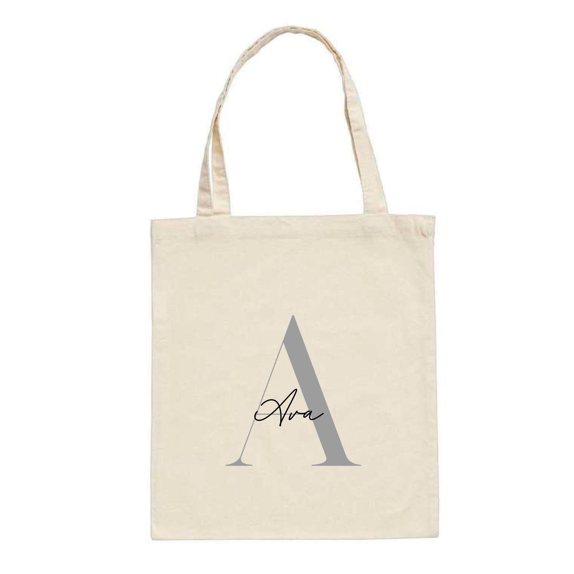 Personalised natural tote bag featuring the name "Ava" over a large silver letter A – custom initial cotton bag for her.