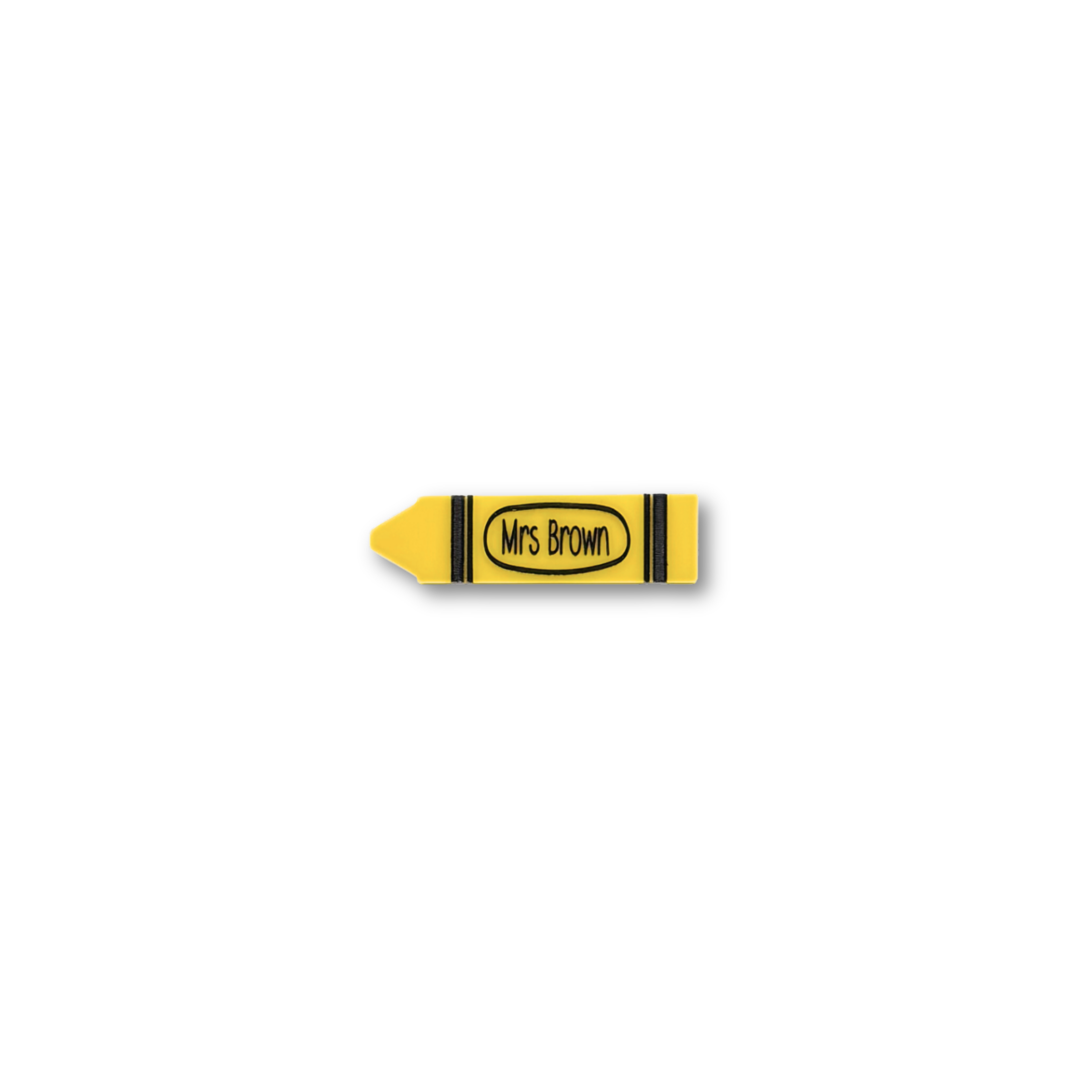 Yellow crayon teacher name badge with “Mrs Brown”