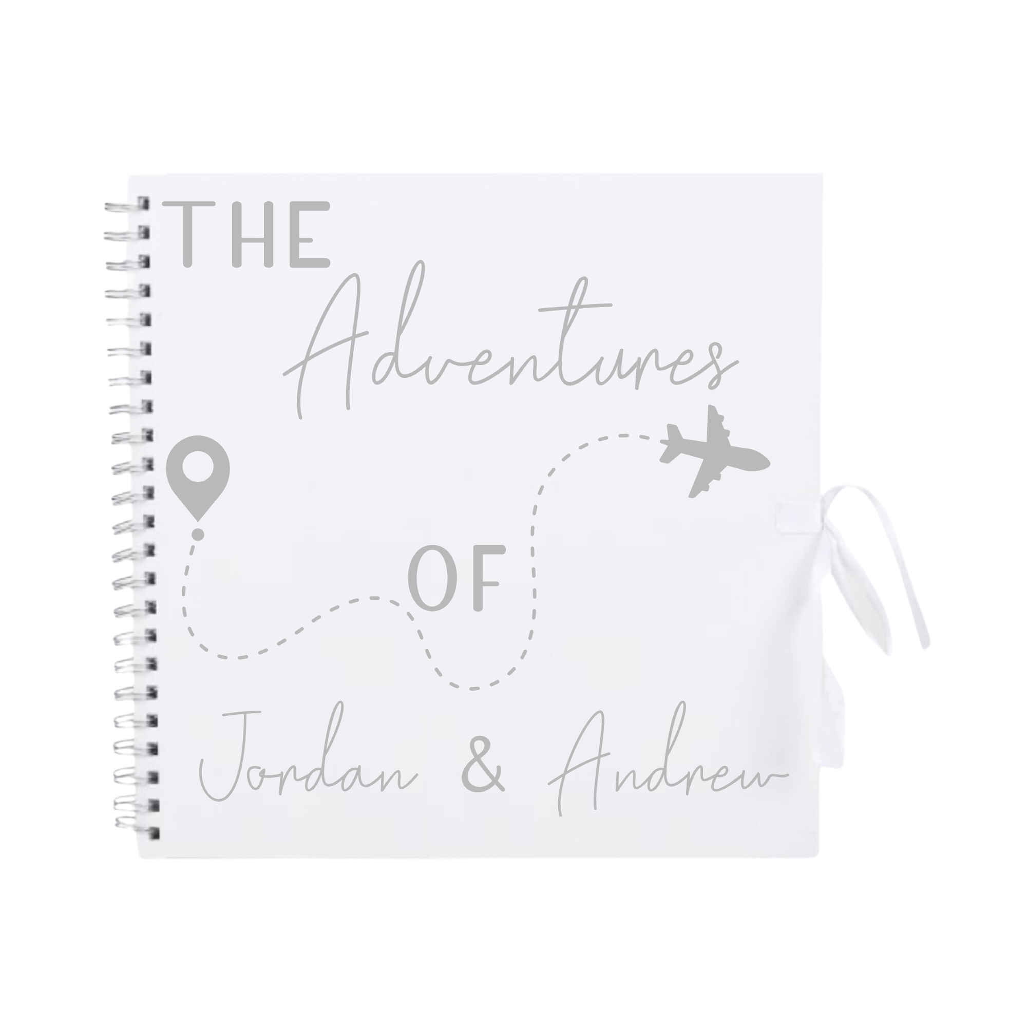 White travel scrapbook album with silver plane and path design, personalised with “Jordan & Andrew” – modern photo journal for travellers.
