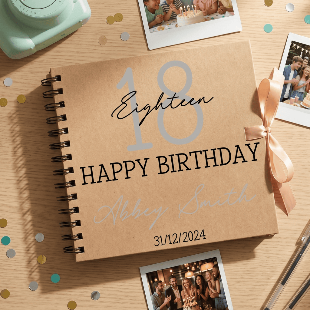Personalised birthday album with photos on a wooden surface
