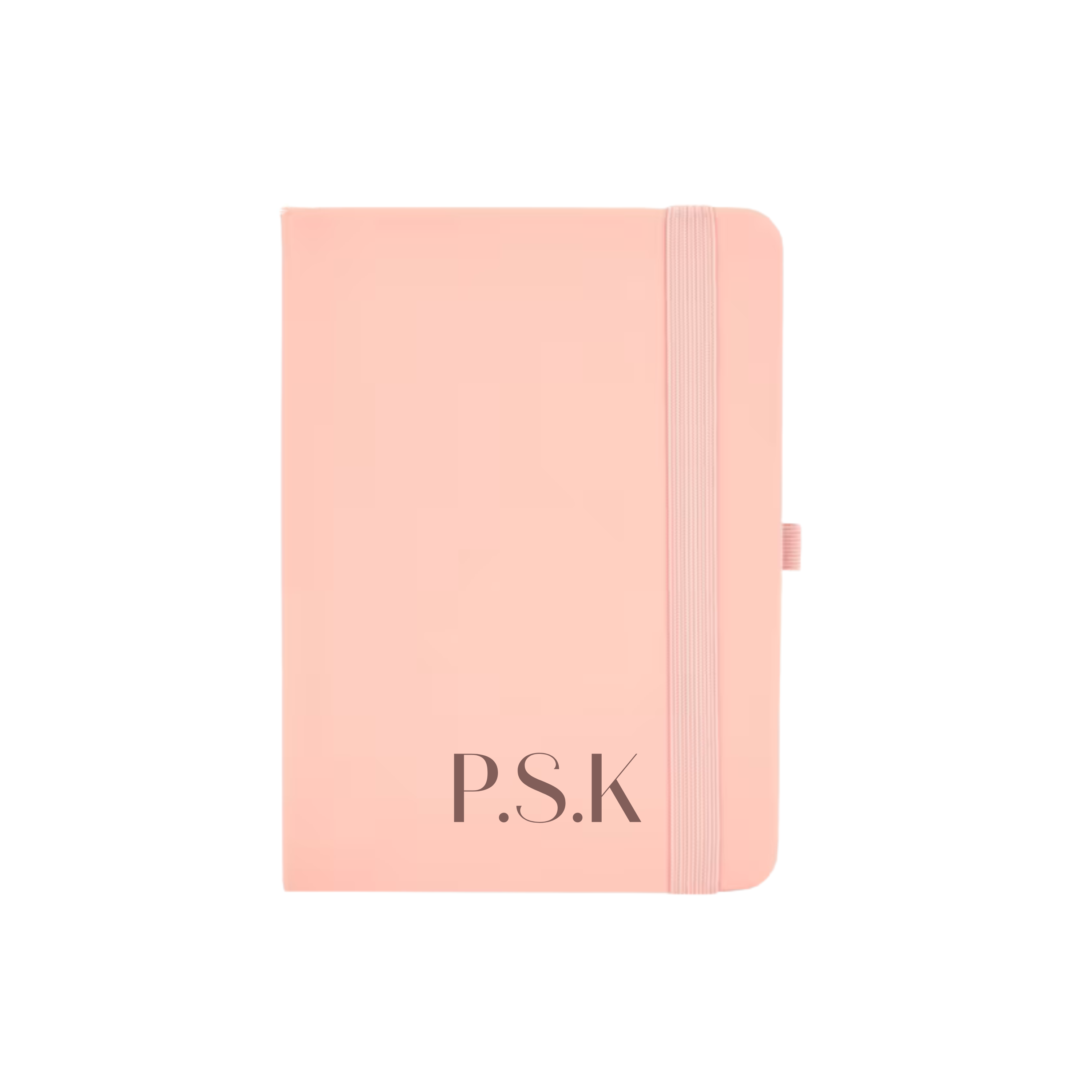 Custom peach A6 notebook with vegan leather cover and initials P.S.K printed in serif font.
