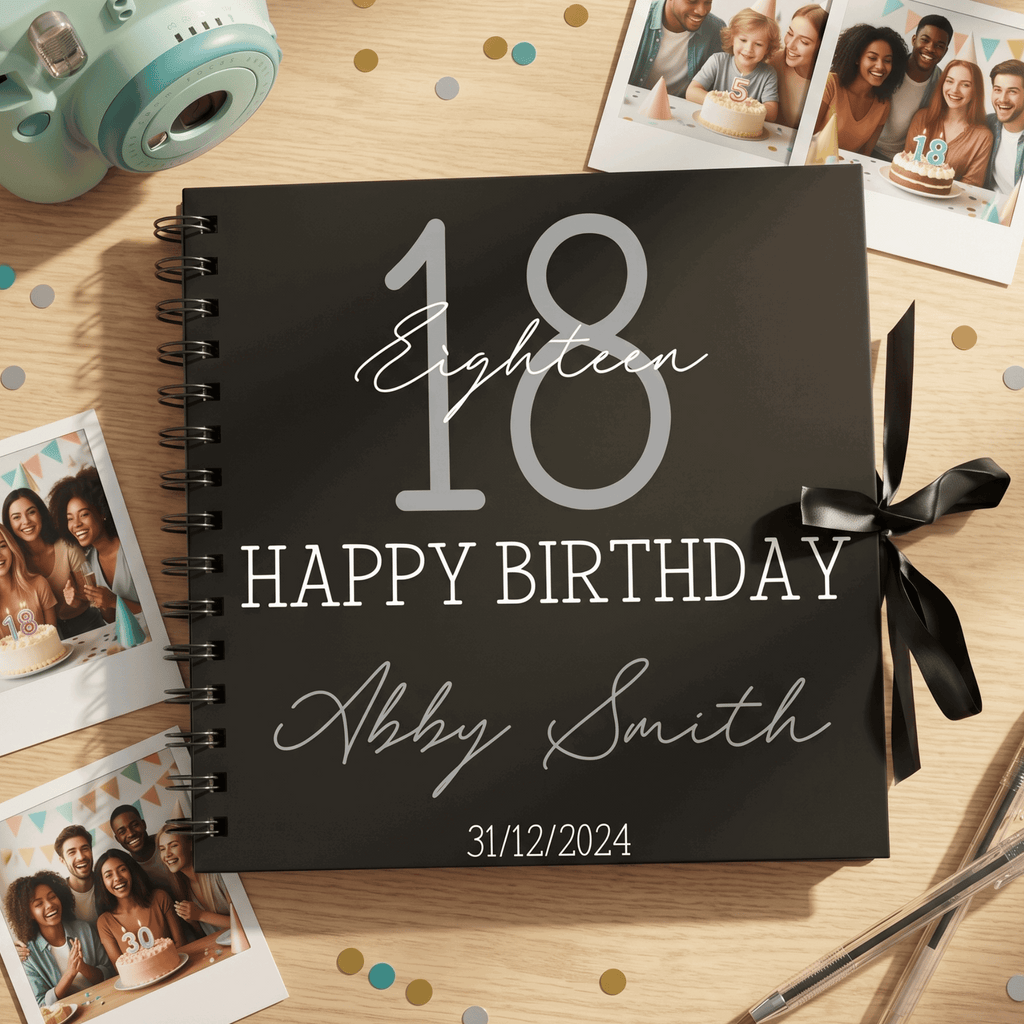 Personalised birthday Album with photos and a camera on a wooden surface