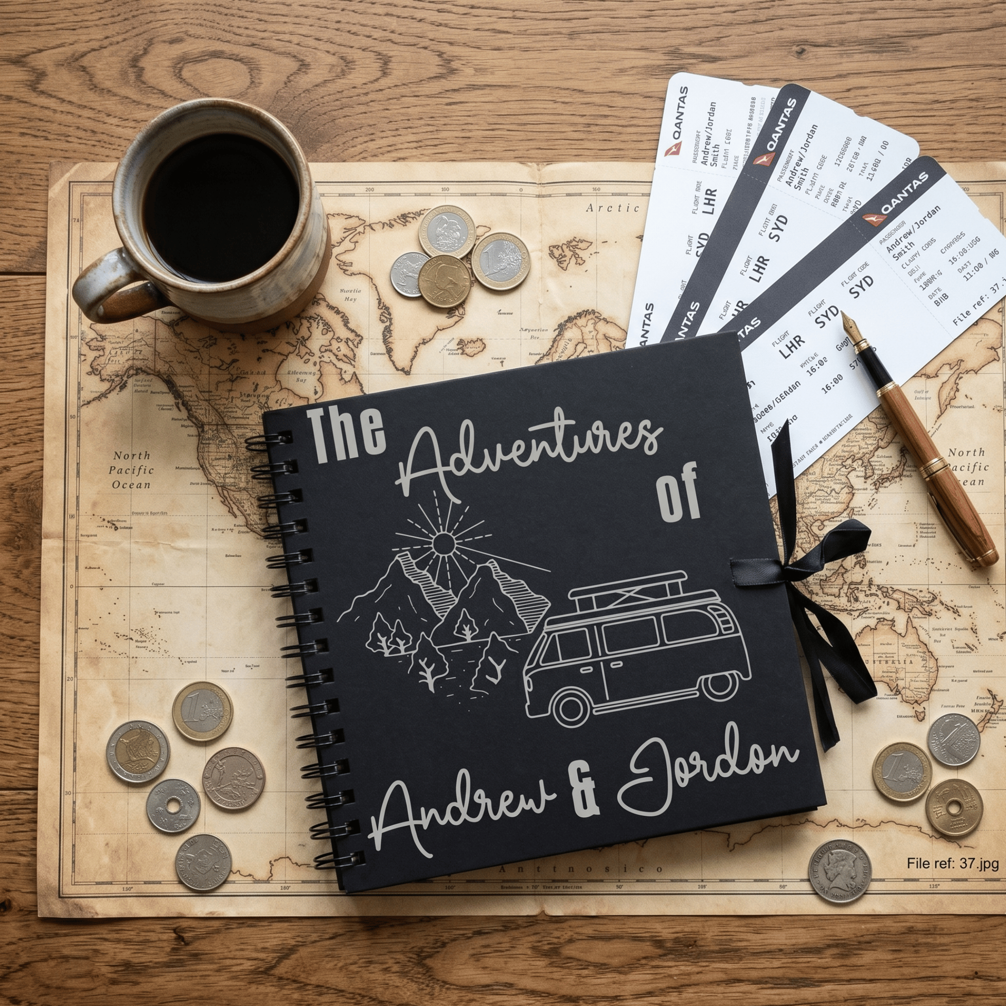 Black album titled 'The Adventures of Andrew & Jordan' on a world map with coins and a cup of coffee.