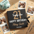 Personalised birthday album with photos and a camera on a wooden surface.