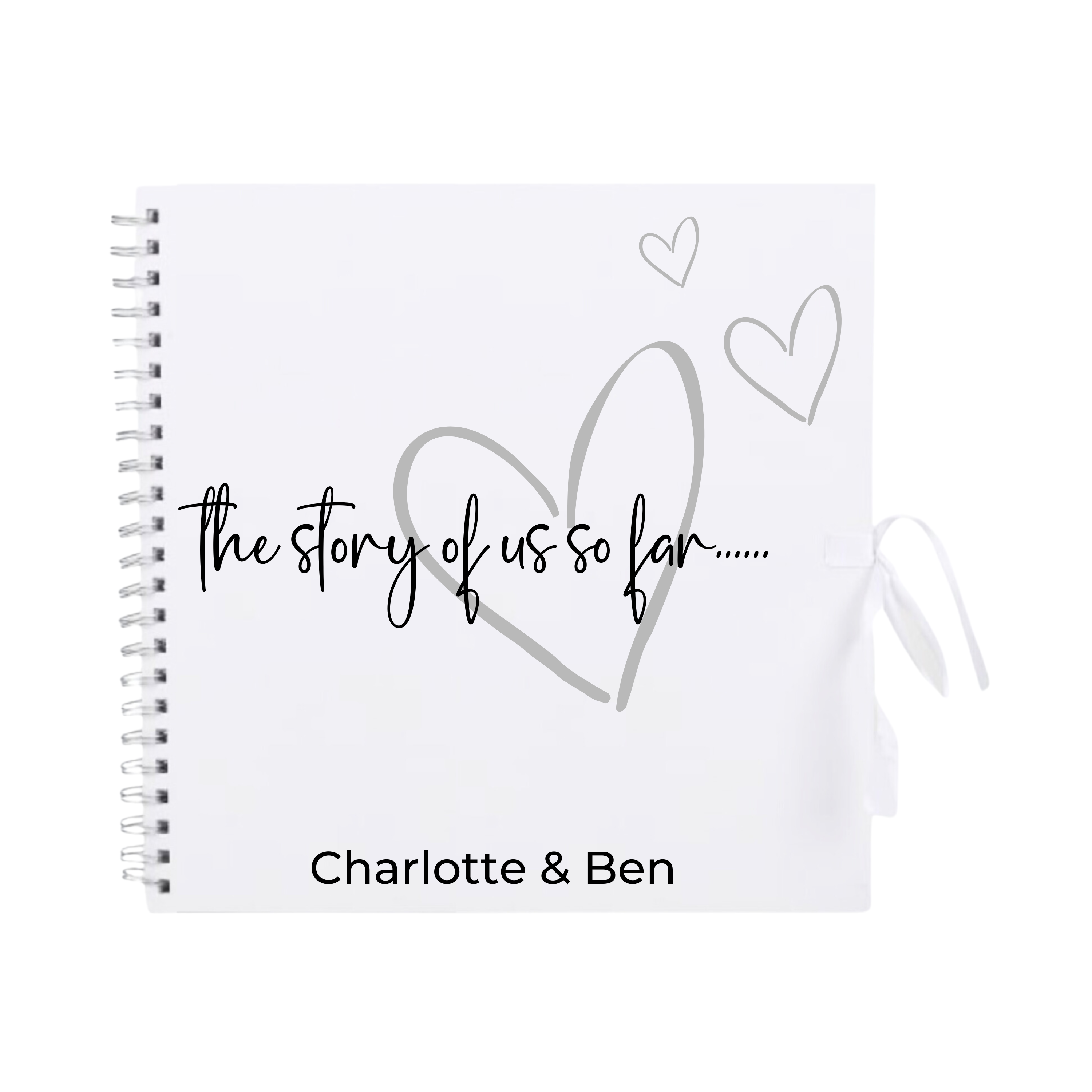 White scrapbook album with silver heart illustrations and custom couple name for Valentine's or anniversary