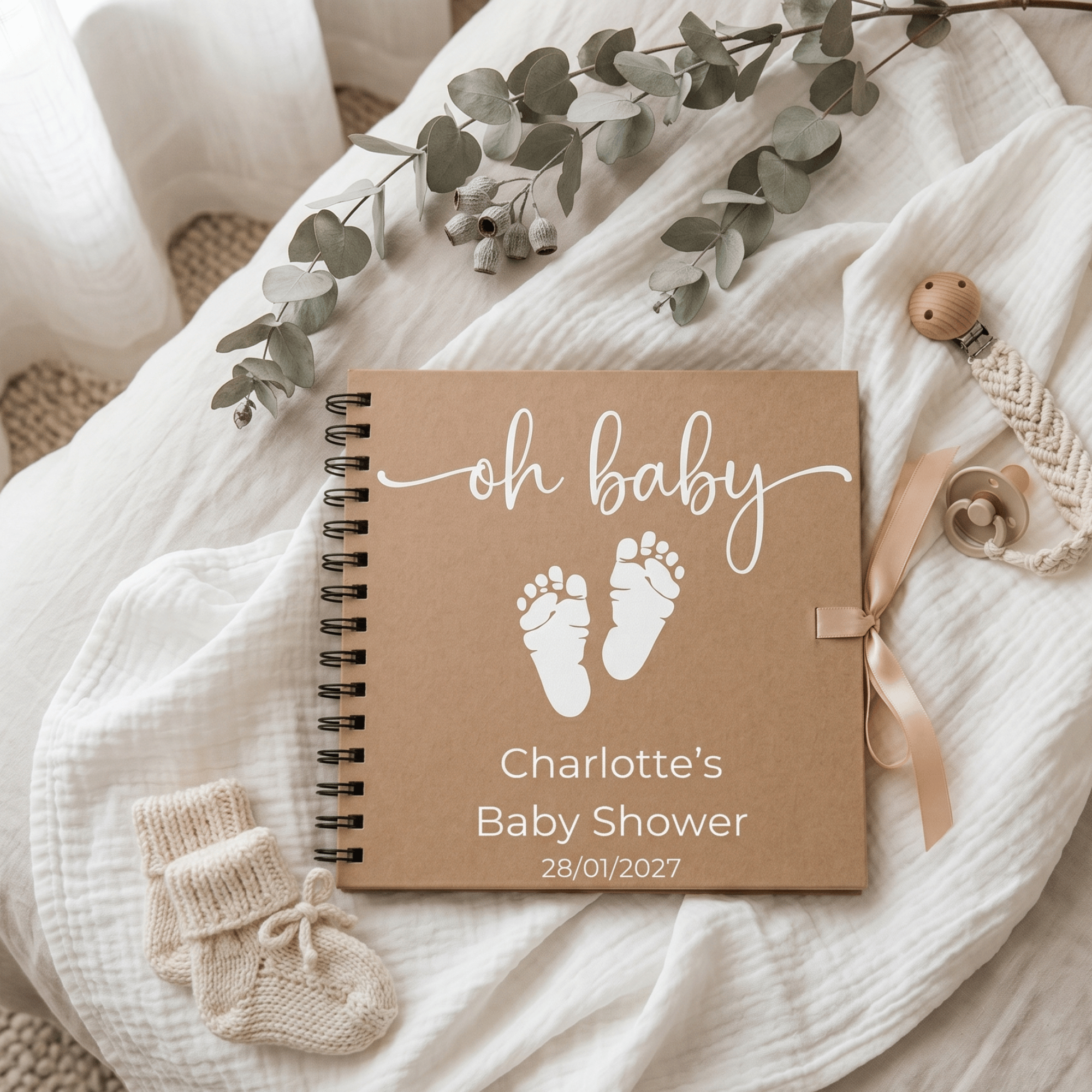 Baby-themed Album with 'oh baby' text and footprints on a soft fabric background.