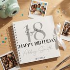 18th birthday Album with photos on a wooden surface
