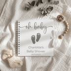 Baby-themed Album with 'oh baby' text and footprints on a textured fabric background.