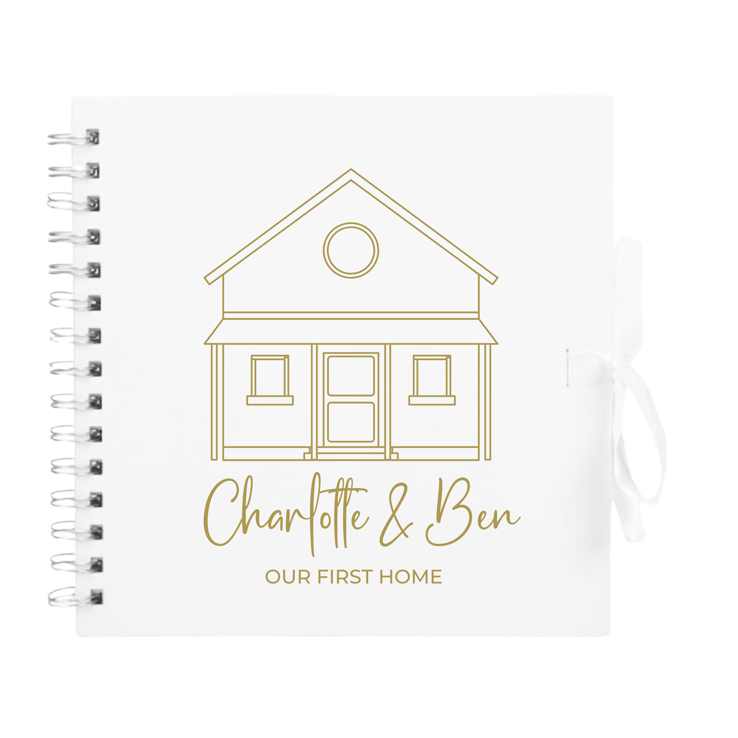 White photo album with gold house design and personalised names, featuring "Our First Home" title