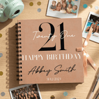 Personalised birthday Album with photos and decorations on a wooden surface