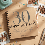Personalised birthday Album with photos and stationery on a wooden surface