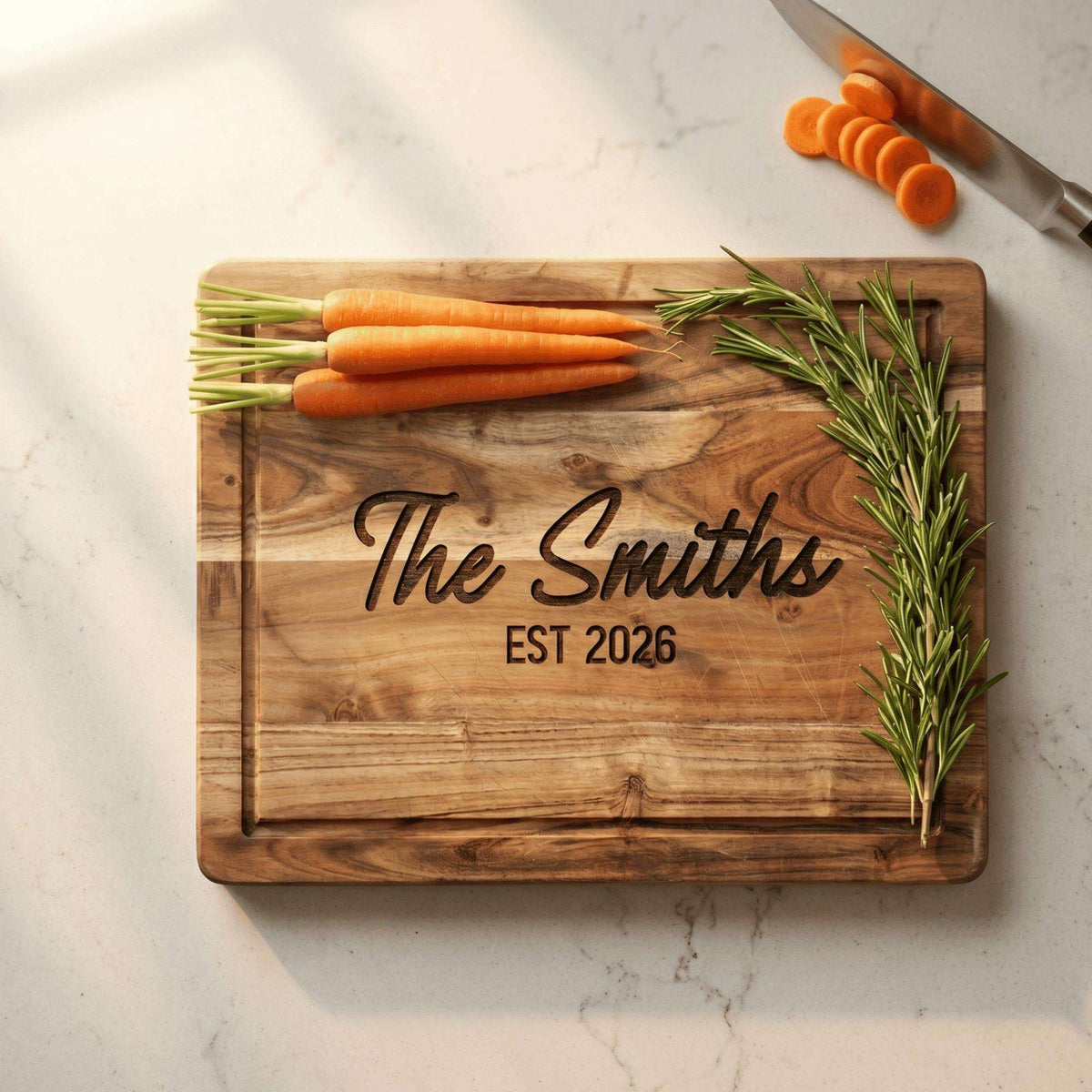 Close up of custom laser engraving on solid acacia wood showing clean modern typography and perimeter juice groove.
