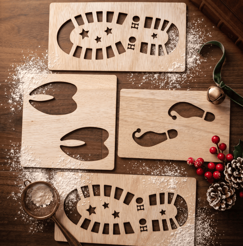 Christmas footprints stencil set featuring Santa boot prints, elf tracks, and reindeer hoof markings on timber