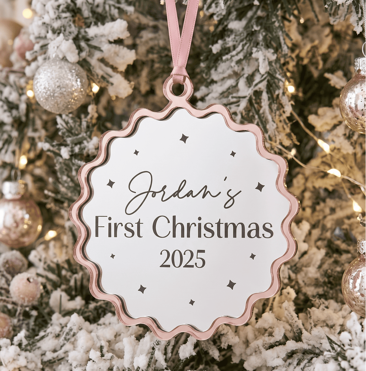 Double layer personalised christmas ornament featuring natural birch timber and acrylic details hanging on a festive Christmas tree