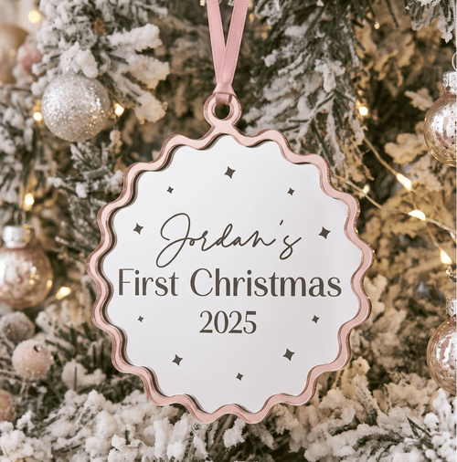 Double layer personalised christmas ornament featuring natural birch timber and acrylic details hanging on a festive Christmas tree