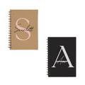 Set of two personalised A5 spiral notebooks – brown kraft with Ava and black with Scarlett, custom name and initial.