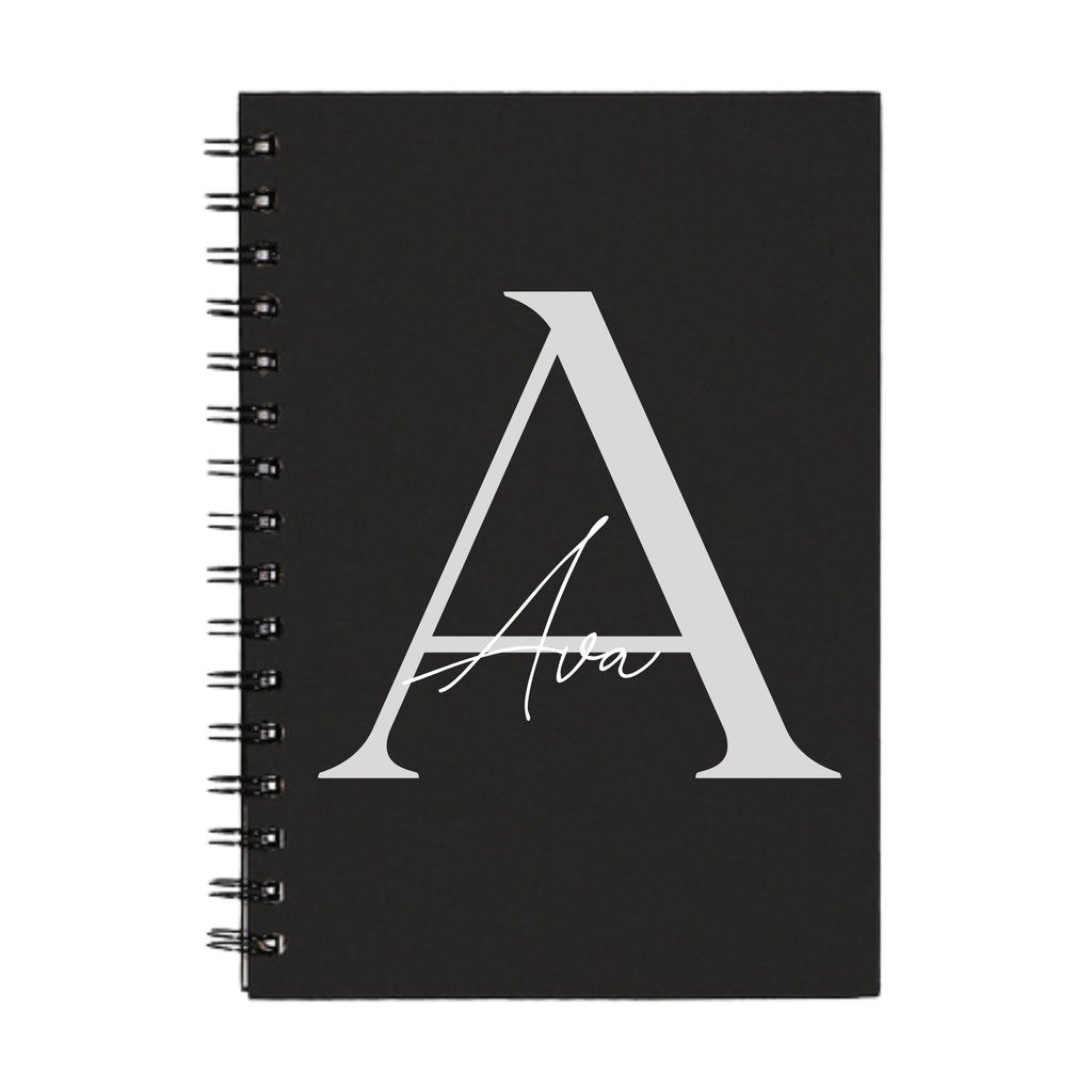 Black A5 spiral notebook with silver A initial and name Ava – personalised notebook gift idea.