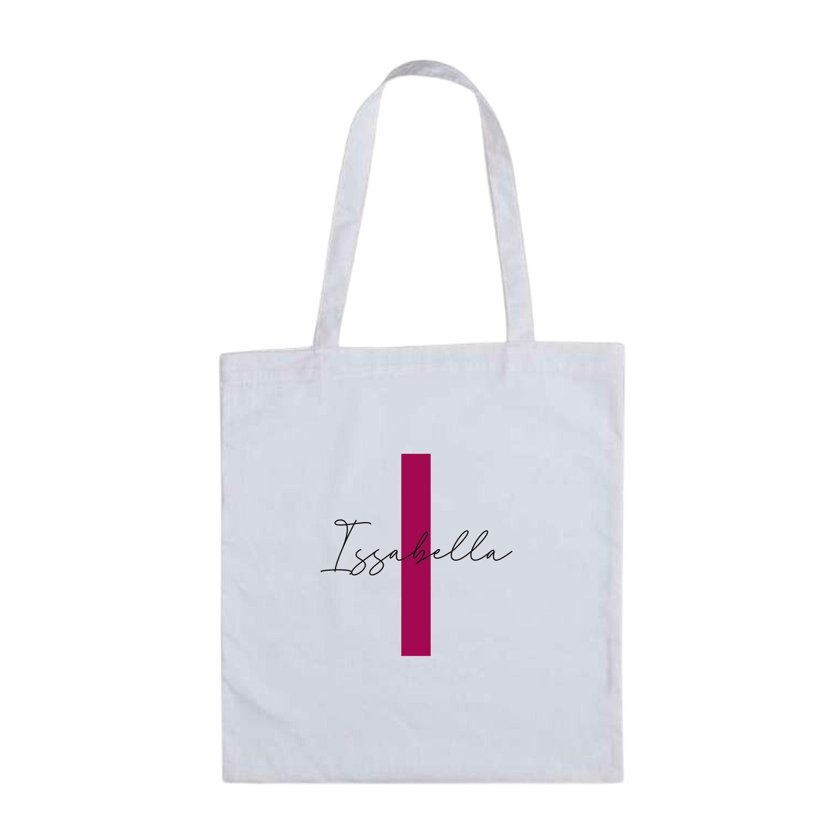 White personalised tote bag featuring magenta letter I and custom name "Issabella" – lightweight cotton initial gift bag.