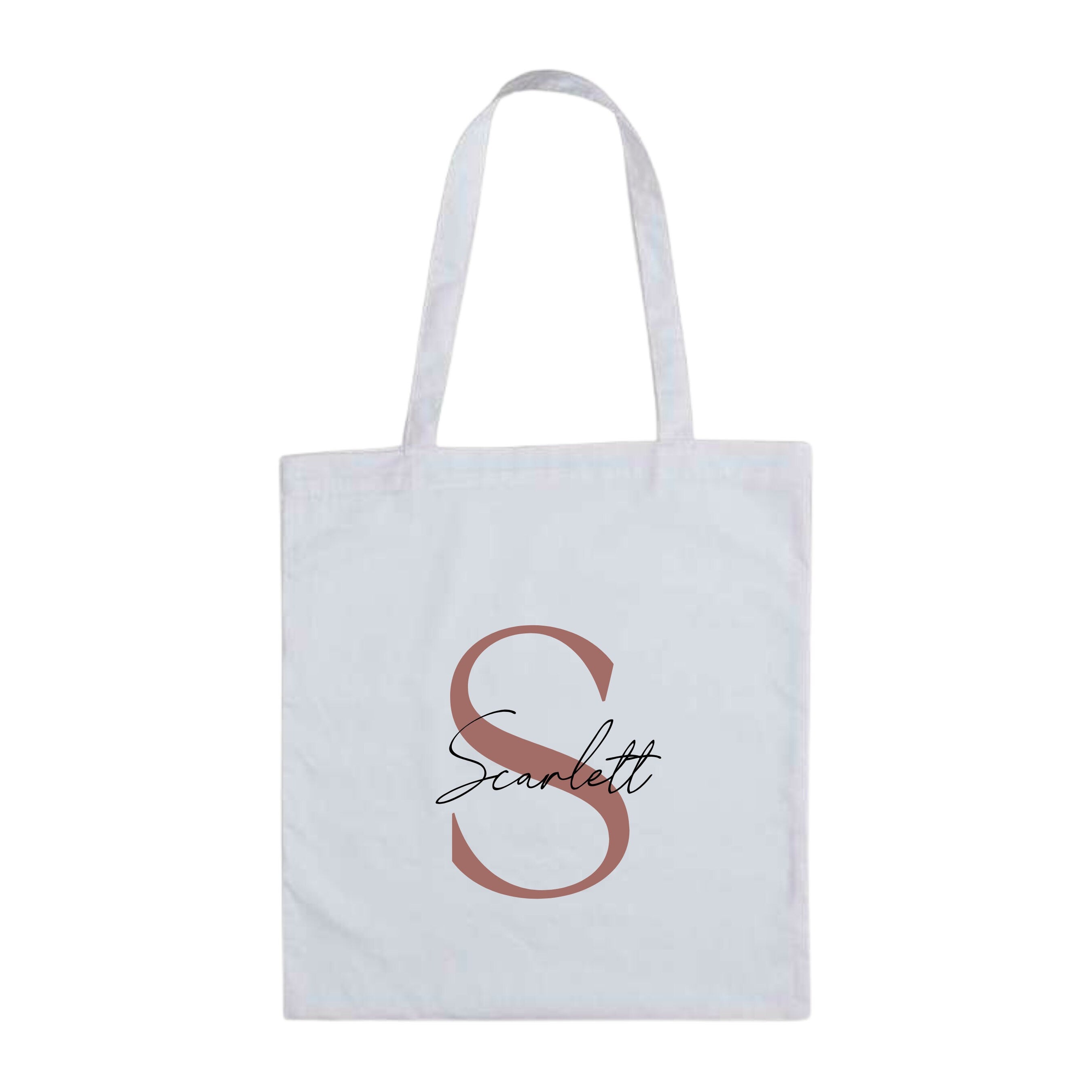 White cotton tote bag with rose gold letter S and the name "Scarlett" – custom reusable personalised initial tote bag.
