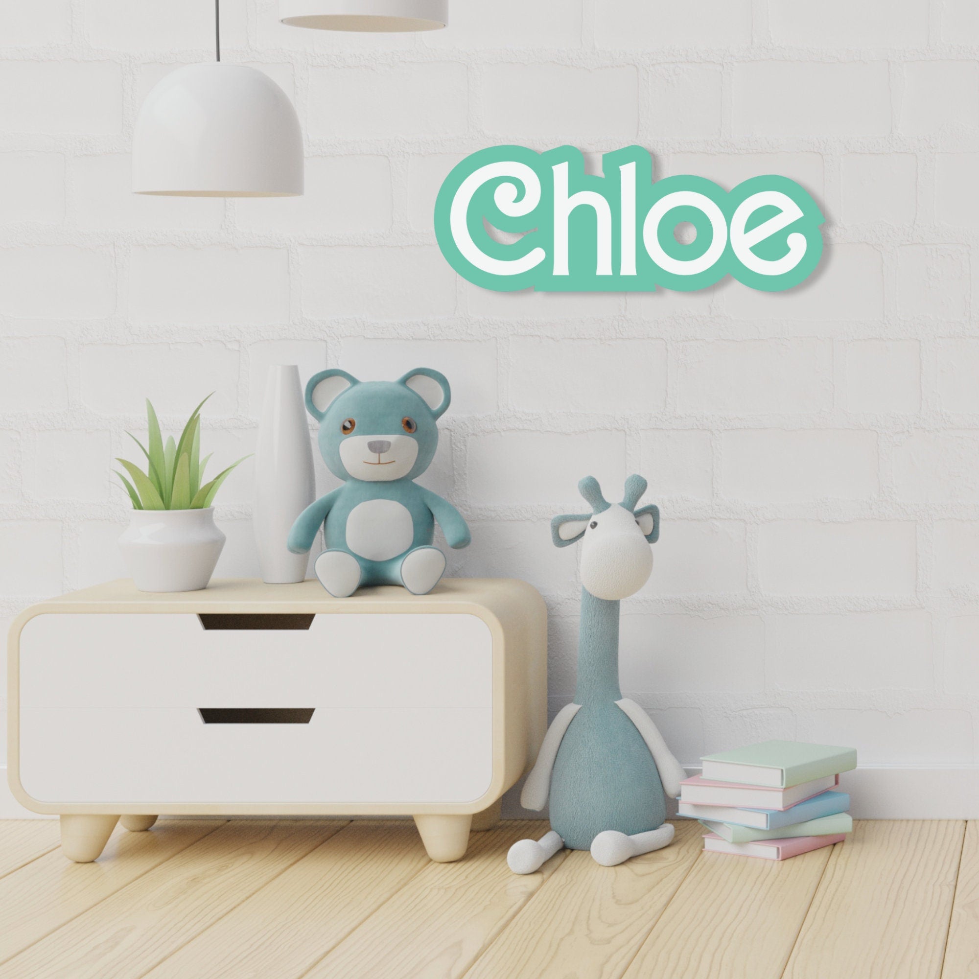 Personalised teal name sign for kids reading 'Chloe' in a soft pastel-themed nursery with plush toys and wall shelve