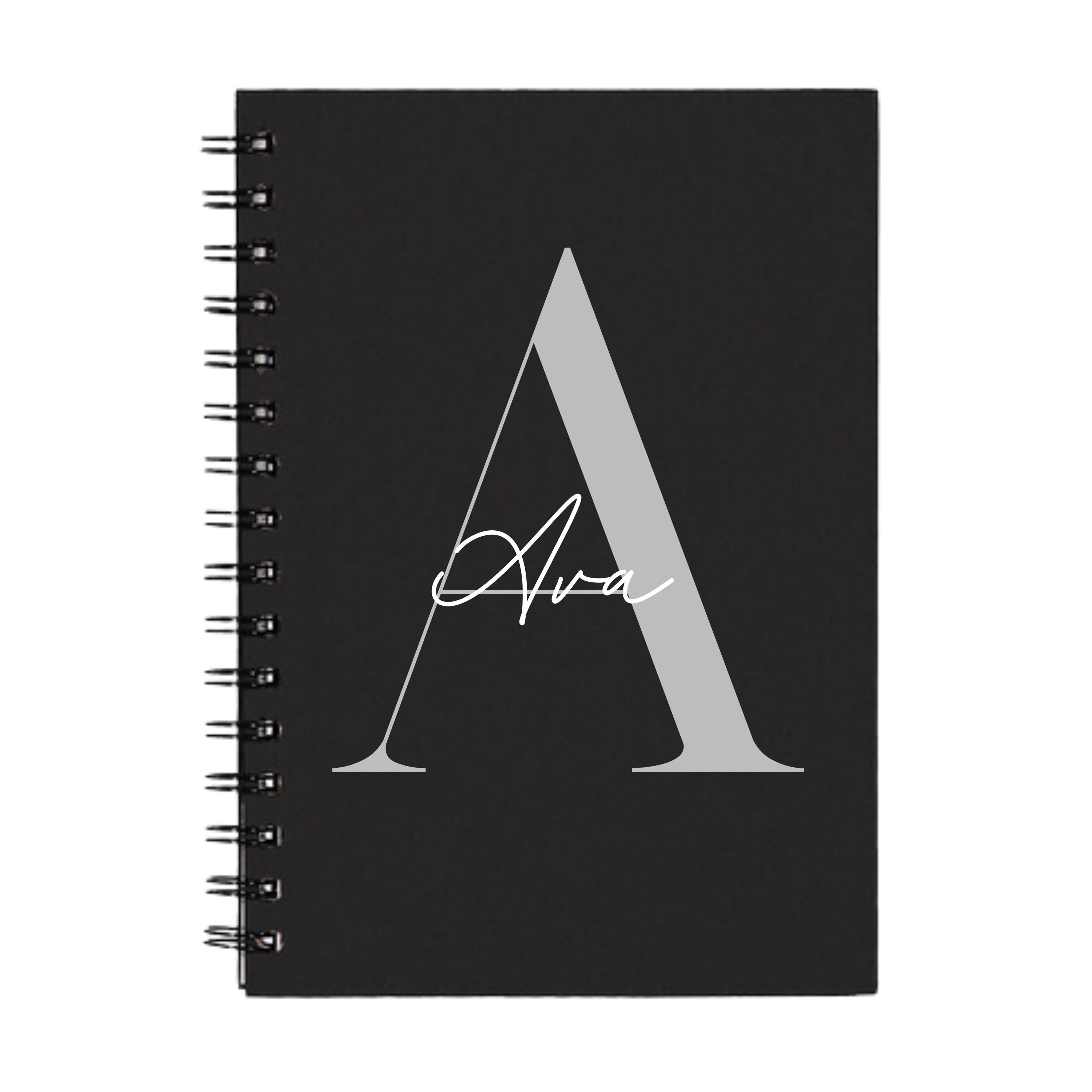 Black A5 spiral notebook with silver A initial and name Ava – personalised notebook gift idea.