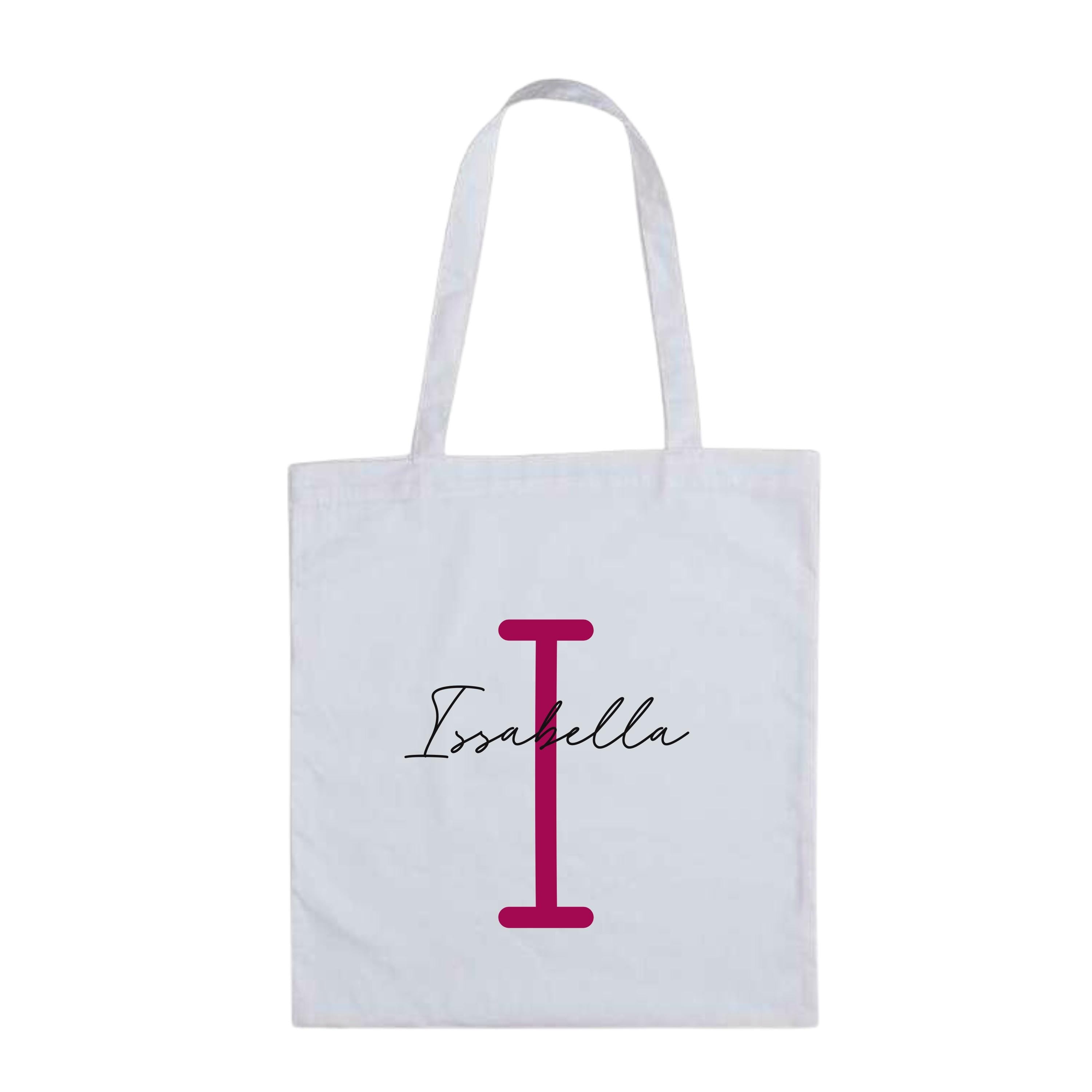 White personalised tote bag with bold magenta letter I and custom name "Isabella" – reusable initial bag for her or him.