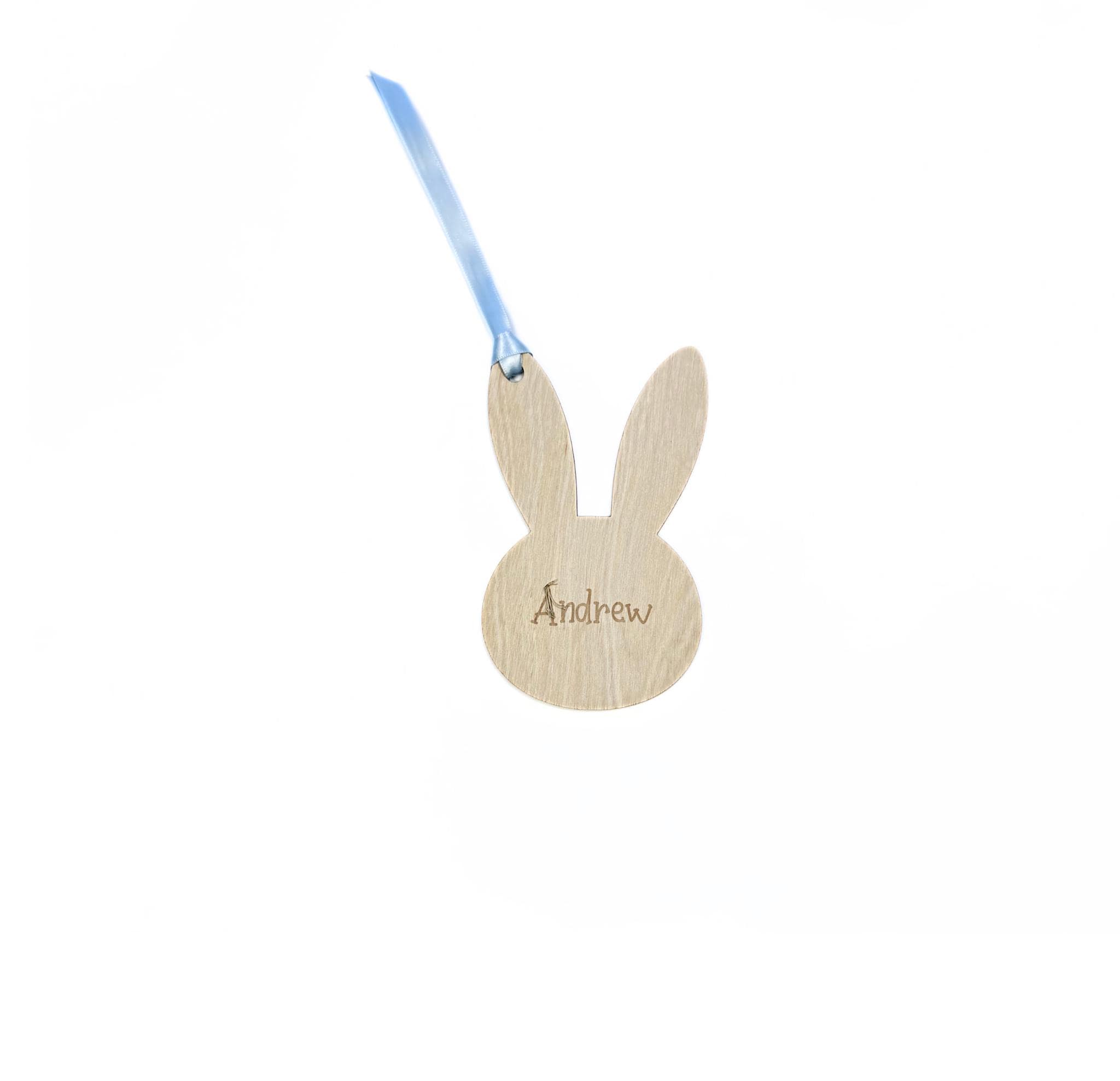 Wooden Easter bunny silhouette tag with engraved name “Andrew” and light blue ribbon – personalised Easter basket tag for kids.
