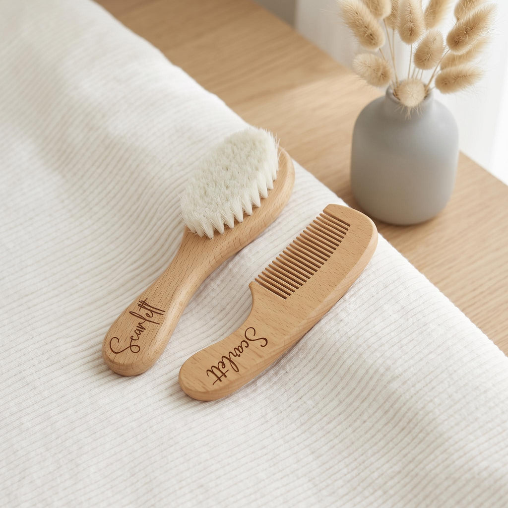 Personalised engraved wooden baby brush and comb set with custom name on white nursery blanket with natural dried bunny tails