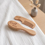 Personalised engraved wooden baby brush and comb set with custom name on white nursery blanket with natural dried bunny tails
