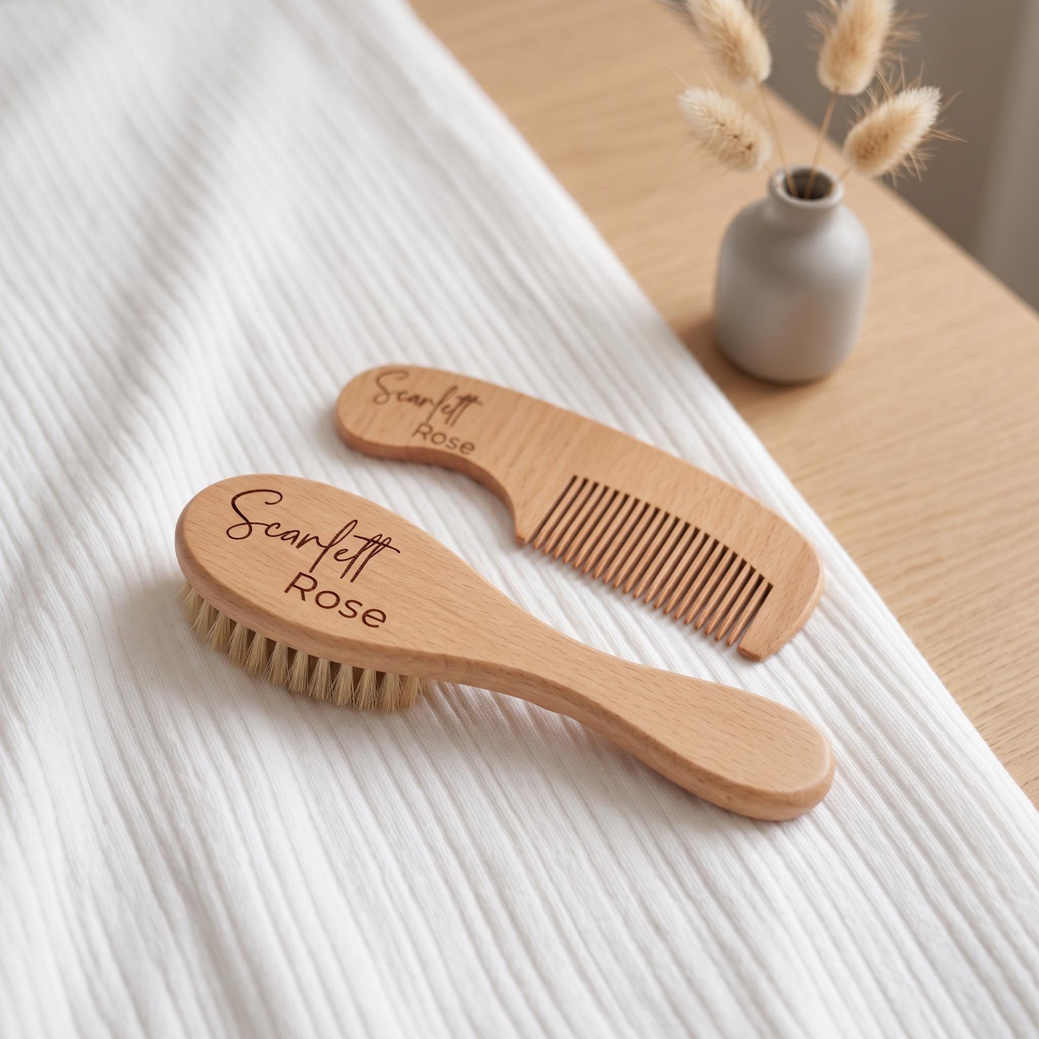 Personalised engraved wooden baby brush and comb set with custom name on white nursery blanket with natural dried bunny tails