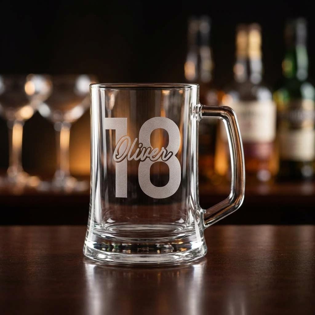 Personalised glass beer mug engraved with a custom name and milestone number, custom beer stein for birthdays and groomsmen gifts