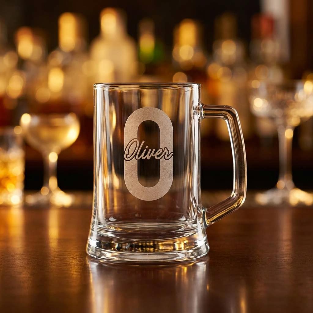 Personalised glass beer mug engraved with a custom name and milestone number, custom beer stein for birthdays and groomsmen gifts