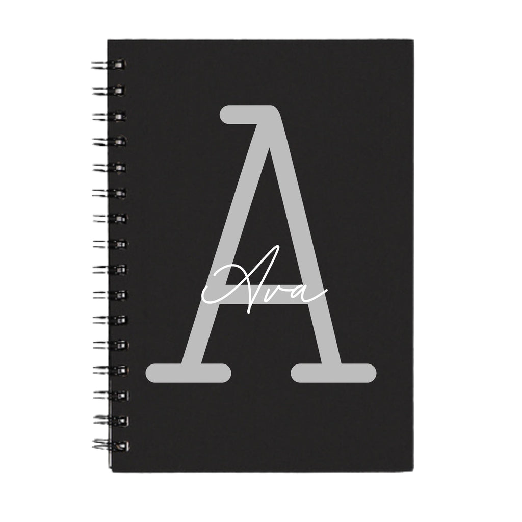 Personalised A5 spiral notebook with custom initial and name in monoline script and slab serif font by Make It Personal Gift Co.