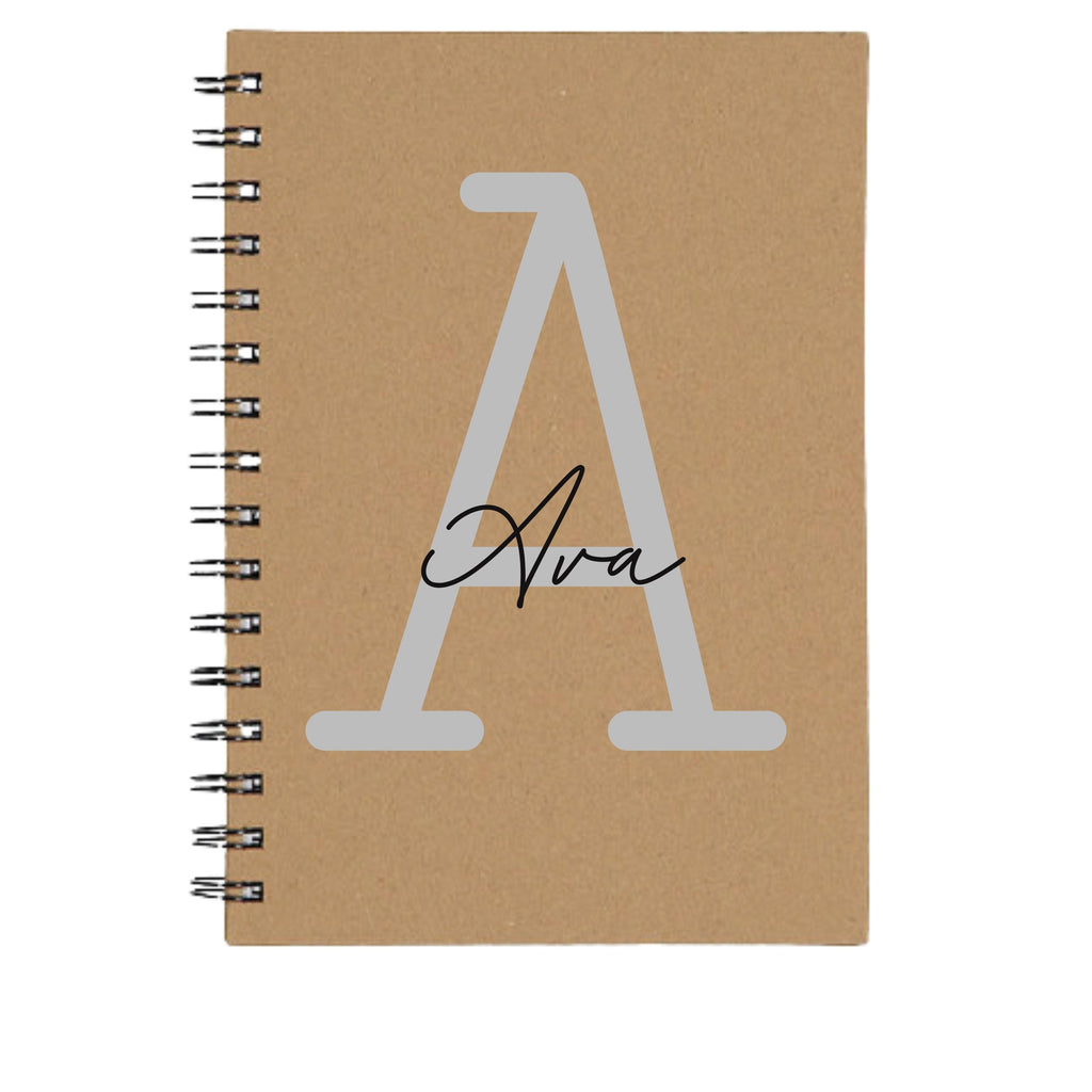 Personalised A5 spiral notebook with custom initial and name in monoline script and slab serif font, black cover, from Make It Personal Gift Co.