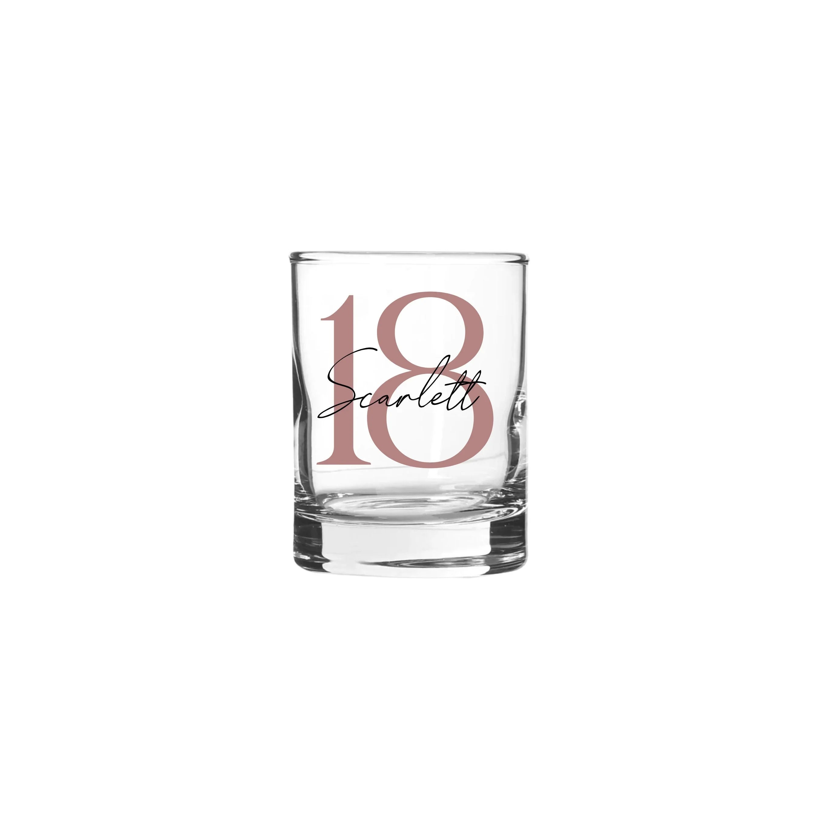 Personalised 65ml shot glass from Make It Personal Gift Co with soft serif and script font design on clear glass.