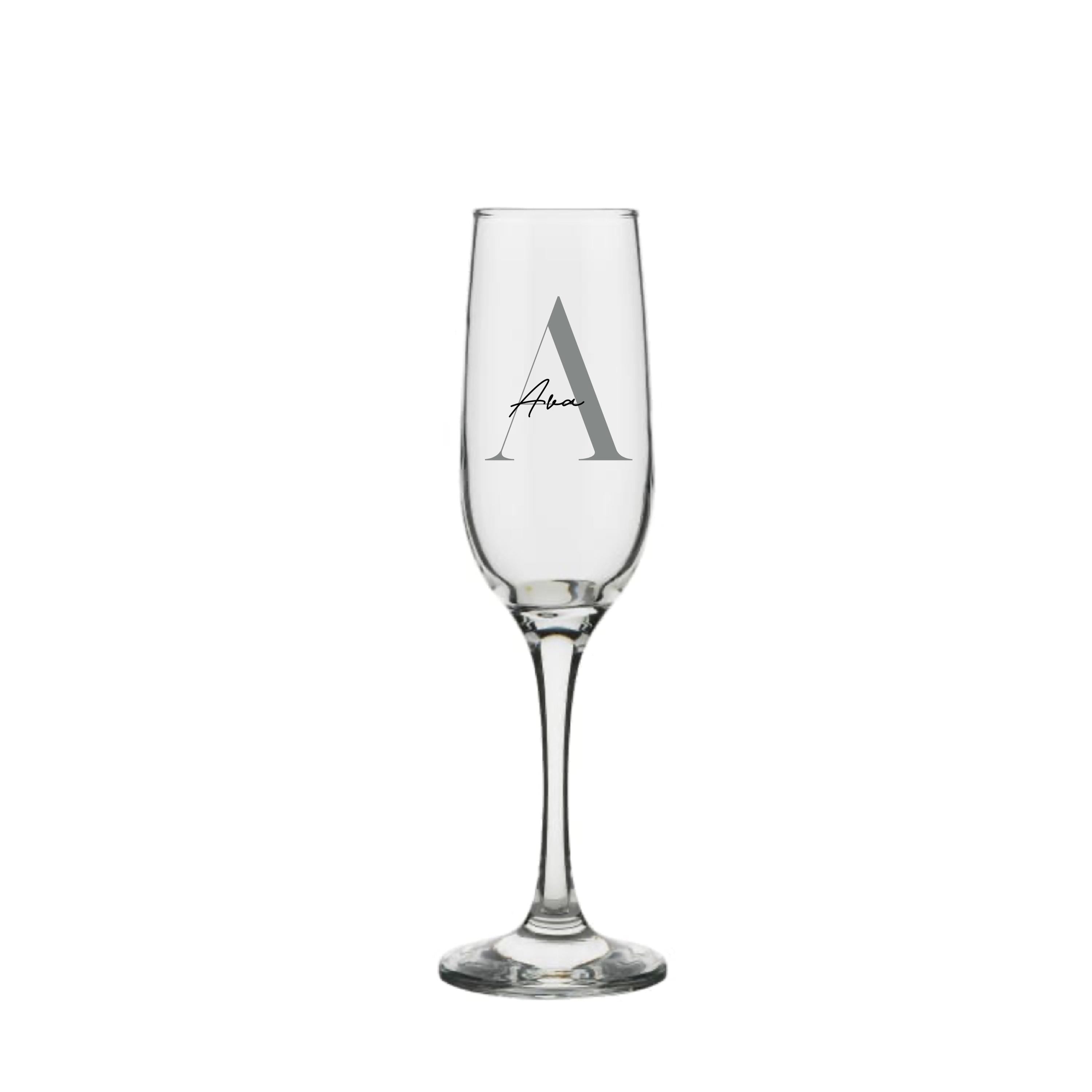 Personalised milestone champagne glass with strong serif and script font, featuring custom text, made by Make It Personal Gift Co.