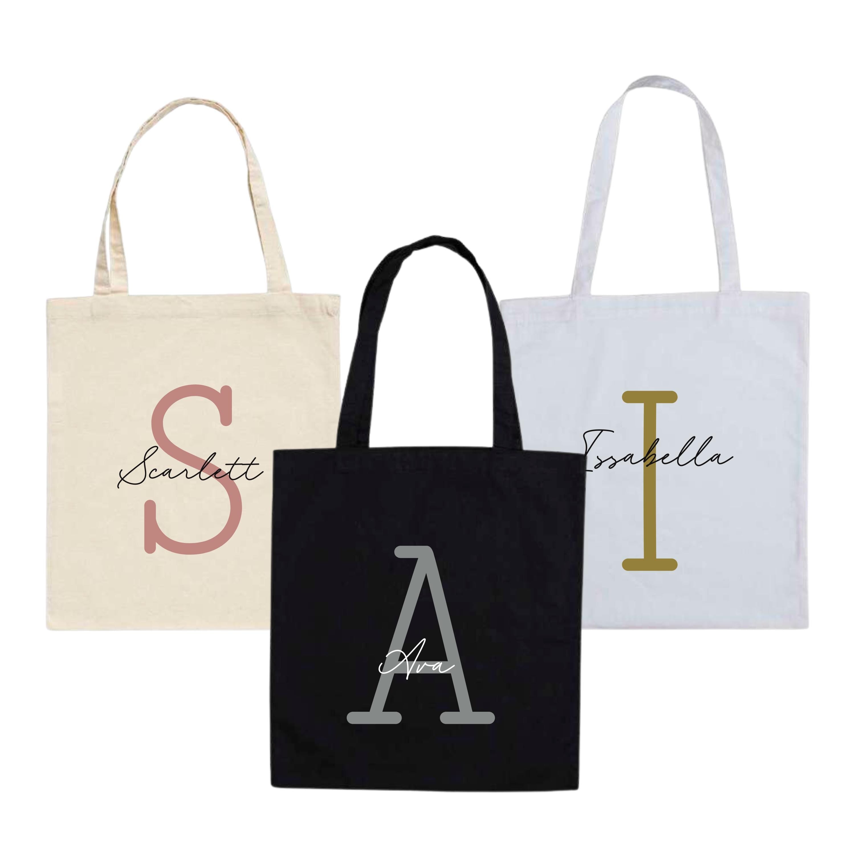 Personalised tote bag with monoline script and slab serif initials and name in black on white fabric by Make It Personal Gift Co.