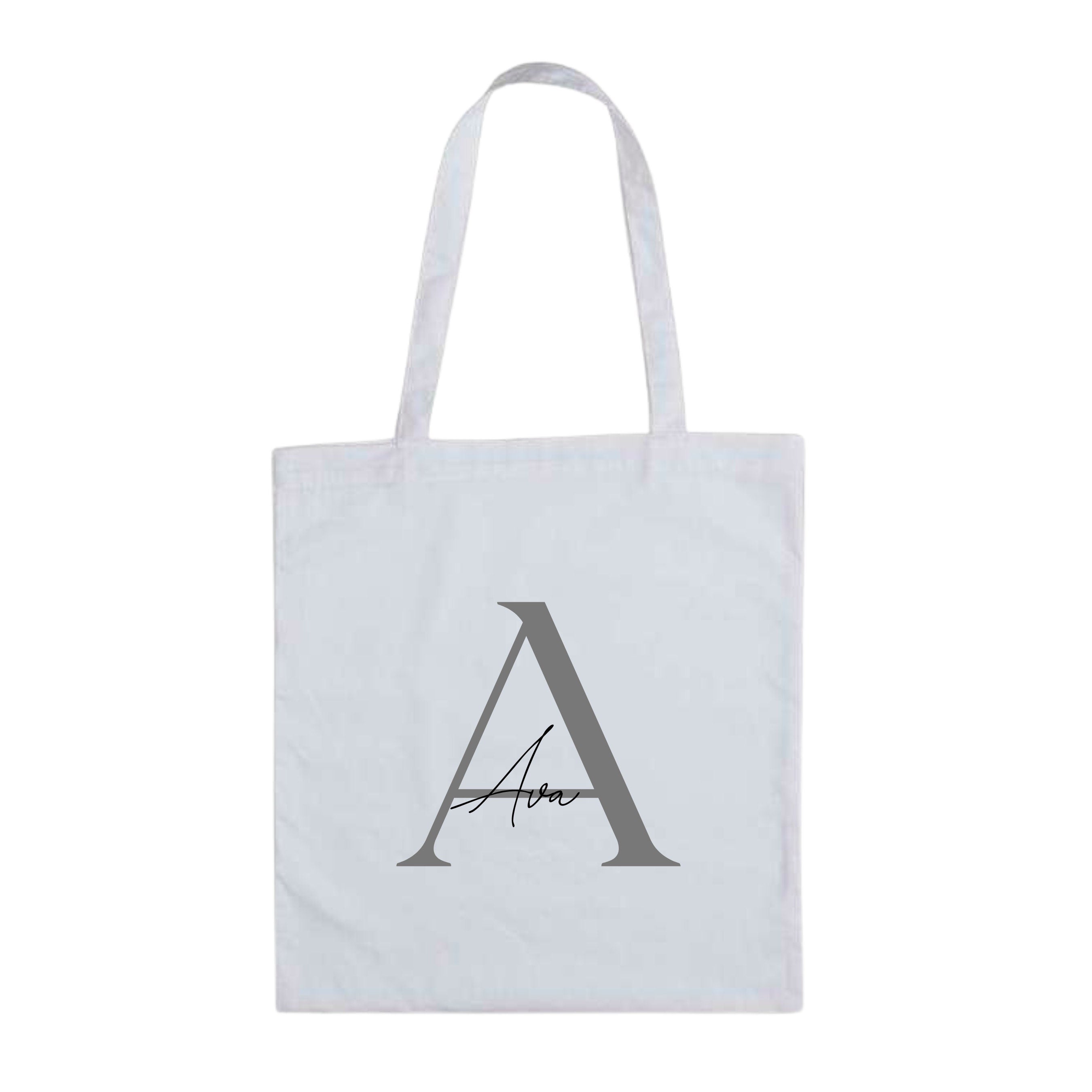 Personalised tote bag with initials and name in soft serif and script fonts, made by Make It Personal Gift Co.