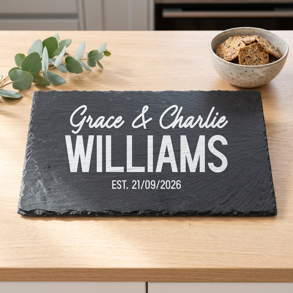 Personalised engraved 30cm x 20cm rectangular slate platter styled with artisanal cheeses and fruit on a table in Australia.