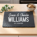 Personalised engraved 30cm x 20cm rectangular slate platter styled with artisanal cheeses and fruit on a table in Australia.