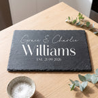 Personalised engraved rectangular slate platter styled with artisanal cheeses and fruit on a table in Australia.