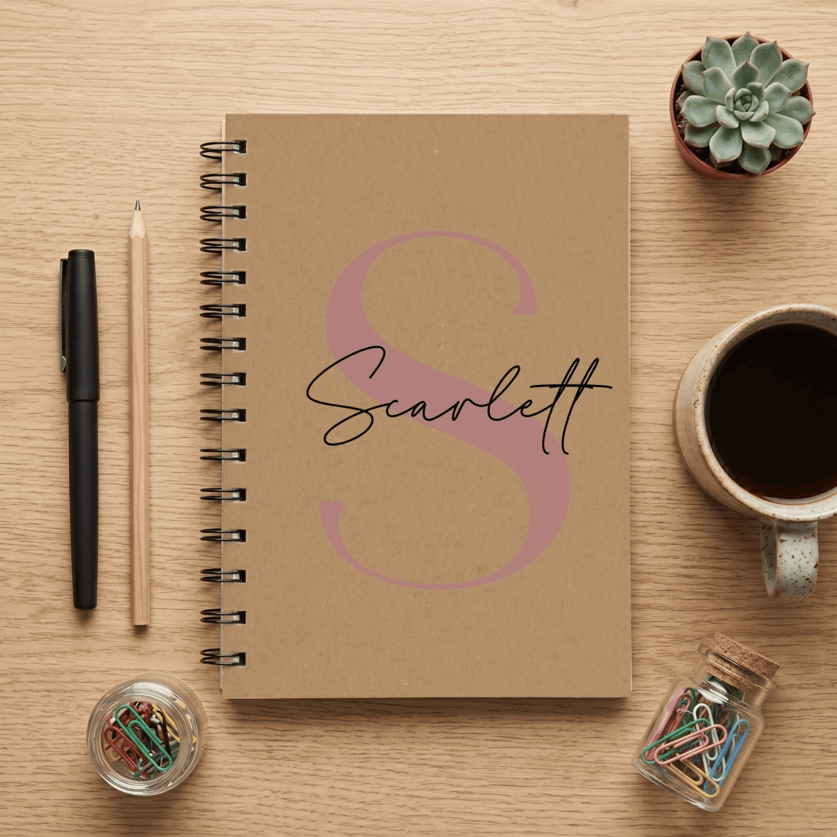 A personalised kraft A5 notebook featuring a rose gold modern printed monogram initial, handcrafted by Make It Personal Gift Co in Australia.