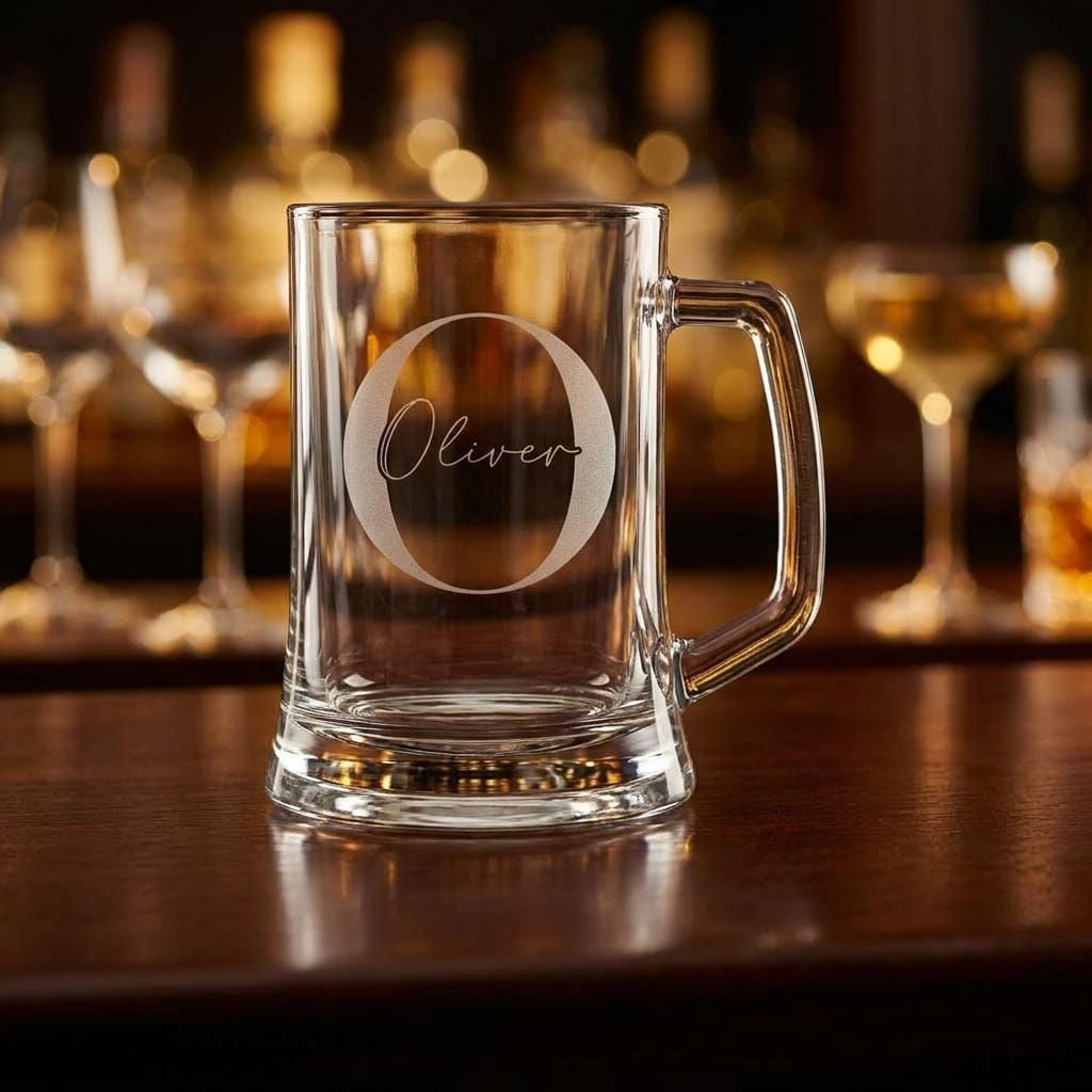 Personalised glass beer mug featuring a classic round monogram engraving, custom beer stein for birthday gifts and celebrations