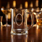 Personalised glass beer mug featuring a modern circular monogram font and milestone number, custom beer stein for birthday gifts
