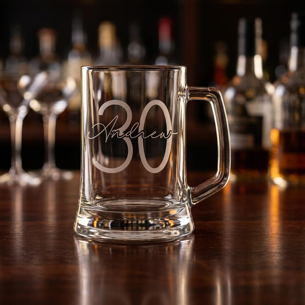 Personalised glass beer mug featuring a modern circular monogram font and milestone number, custom beer stein for birthday gifts