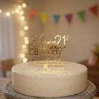 Custom gold mirror acrylic cake topper displaying Happy 21st Birthday Isabella above a celebration cake.
