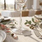 A personalised hooped wine glass charm featuring a custom laser cut guest name in silver mirror acrylic clipped onto a gold metal stem hoop, handcrafted by Make It Personal Gift Co in Australia.